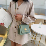 Stone Buckle Leather Mini Crossbody Bag