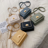 Stone Buckle Leather Mini Crossbody Bag