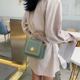 Stone Buckle Leather Mini Crossbody Bag